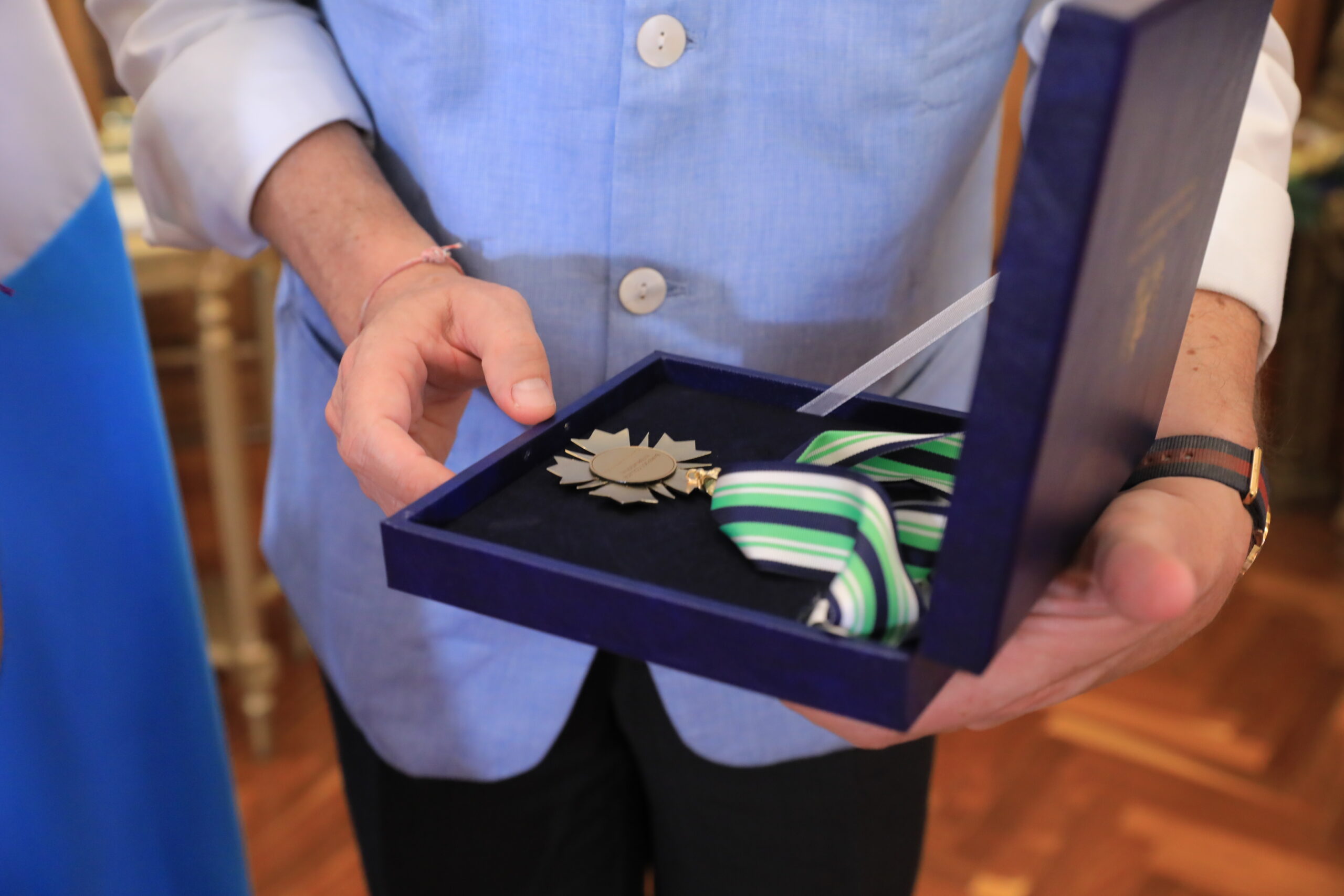 President of Guatemala presents Barefoot College International CEO with the Presidential Medal of Merit for our work on the environment 