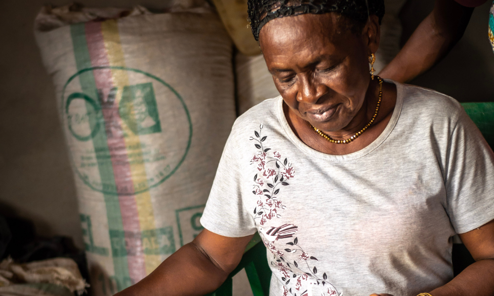 Niembain Charlotte works on a solar panel