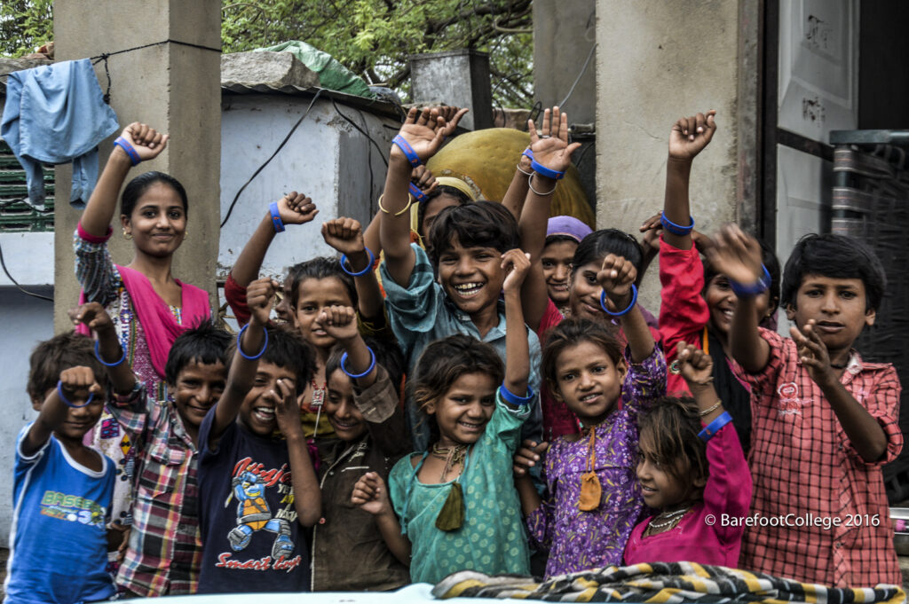 Children from Barefoot's nightschool showing support for girls education by wearing Malala Campaign Bands